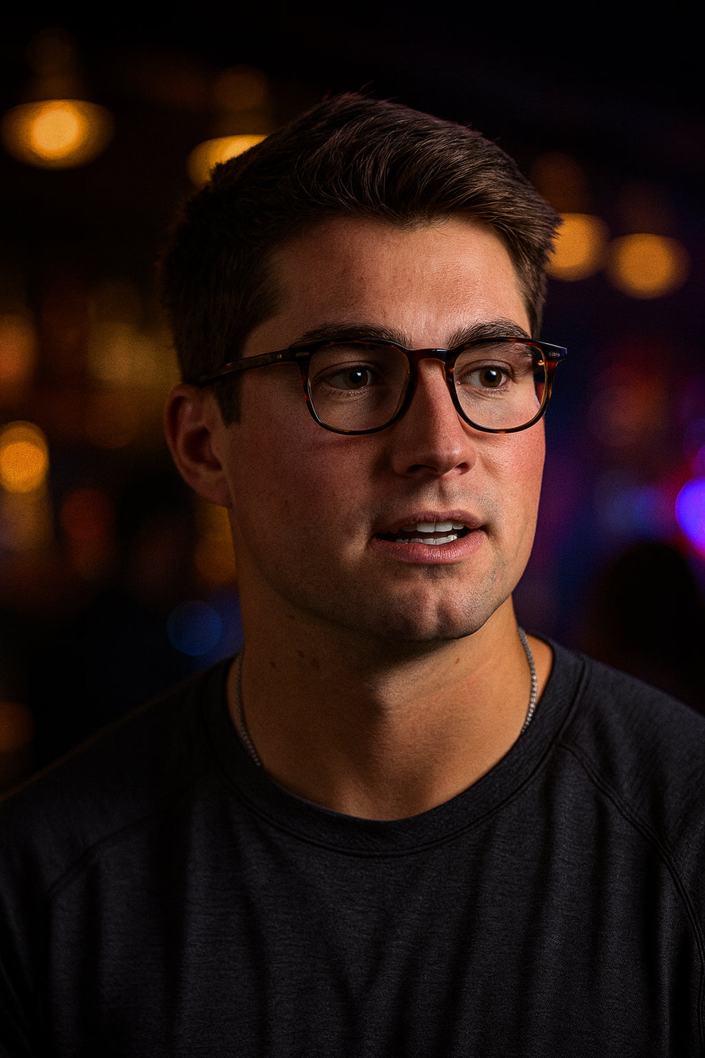 Man wearing glasses with a blurred background