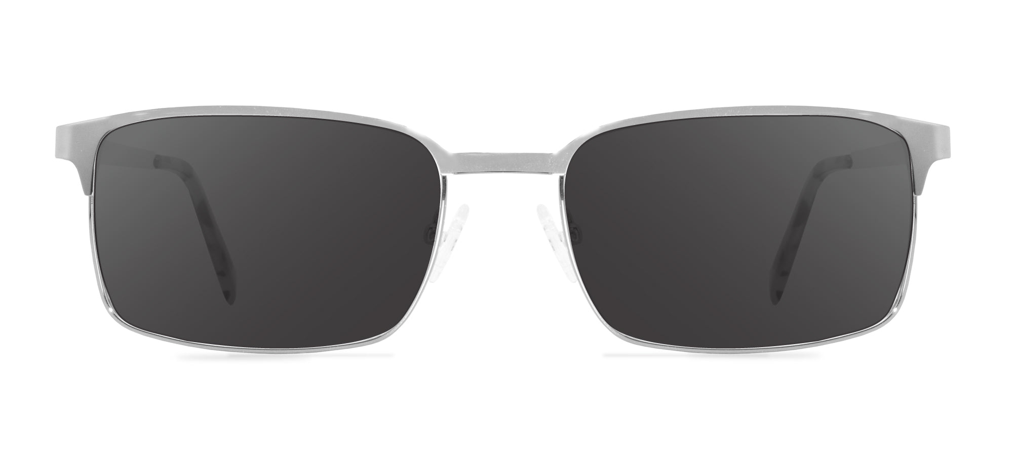 Sunglasses with dark lenses and silver frame on a white background