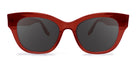 Red sunglasses with dark lenses on a white background