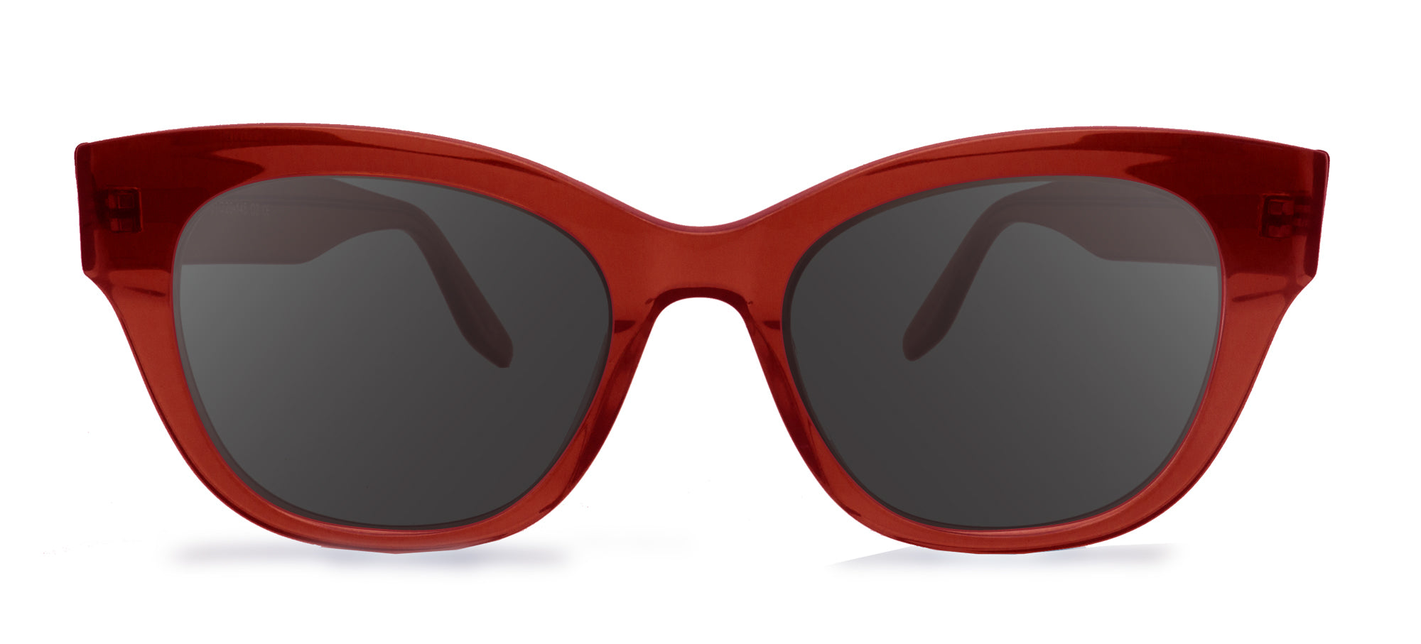 Red sunglasses with dark lenses on a white background