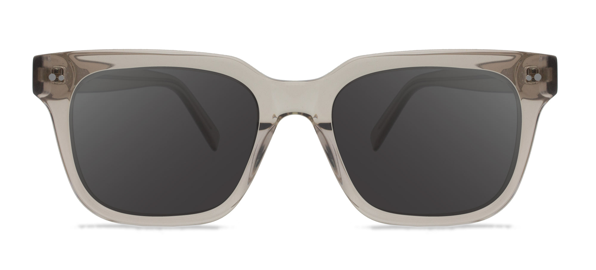Sunglasses with a transparent frame and dark lenses on a white background